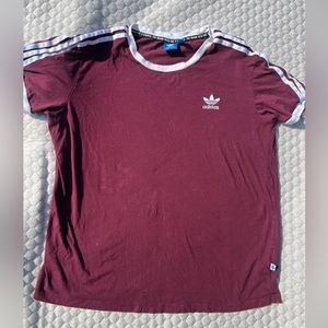 Adidas Burgundy t shirt . Logo stripes on arms size Med